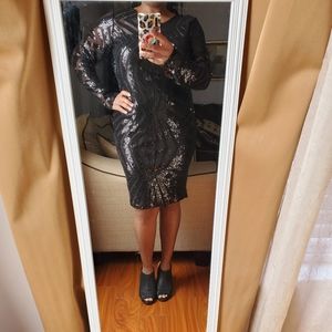 Black sequins dress.